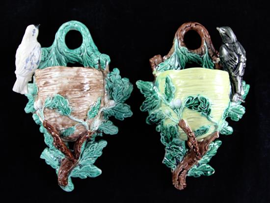 A pair of French majolica birds nest and oak branch wall pockets, late 19th century, 11.5ins